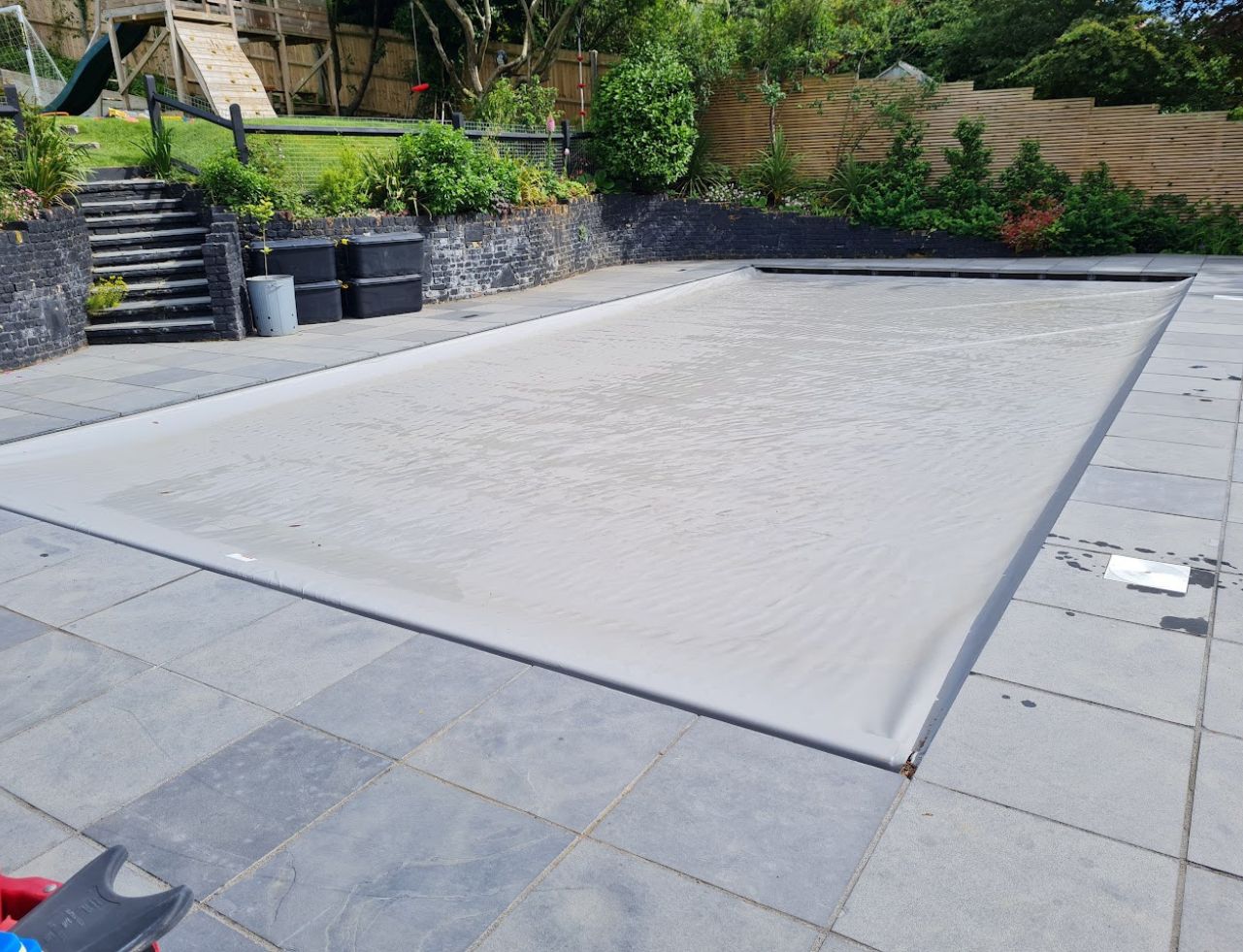 grey swimming pool cover